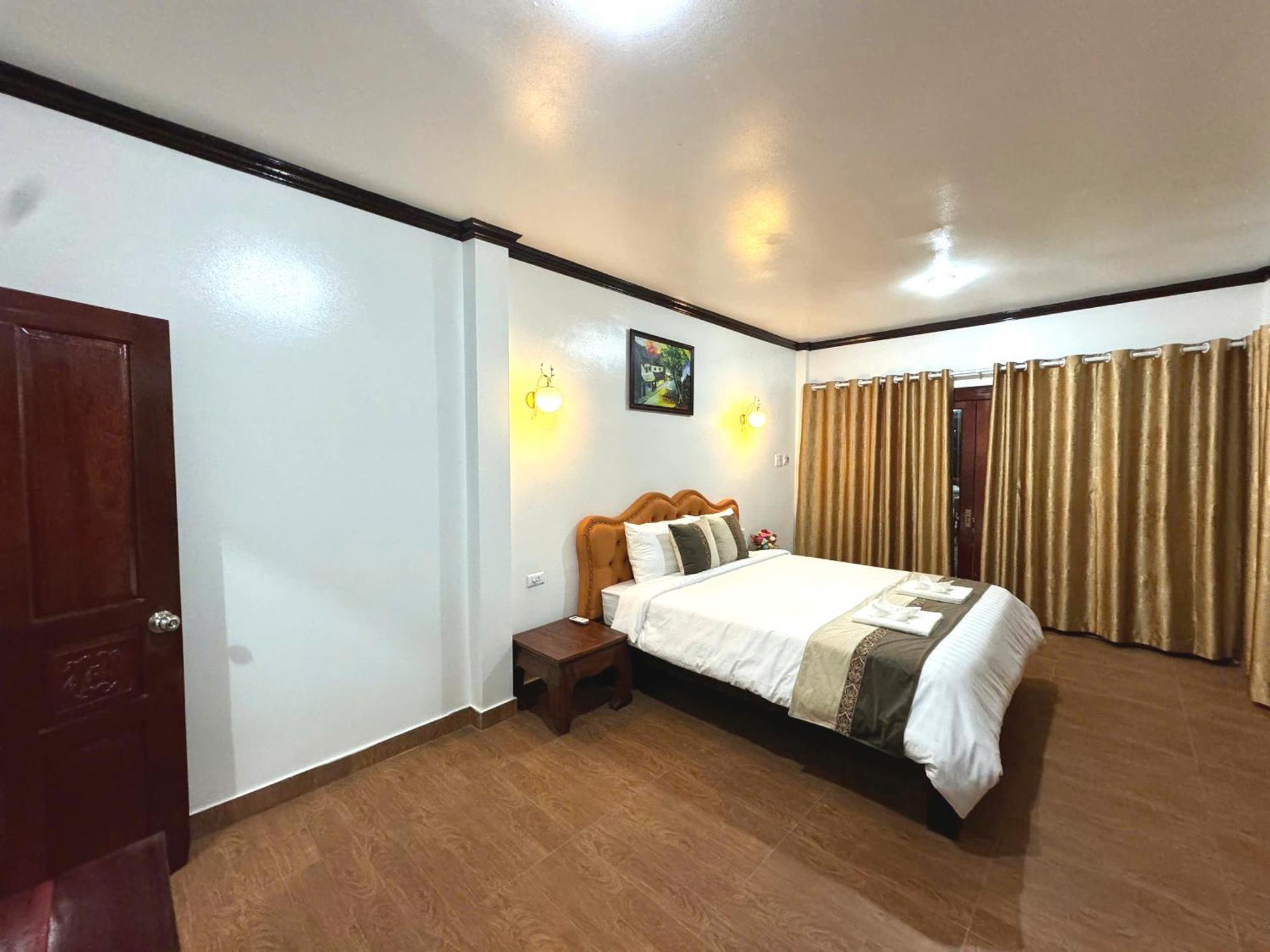 Win Hotel Vang Vieng Exterior photo
