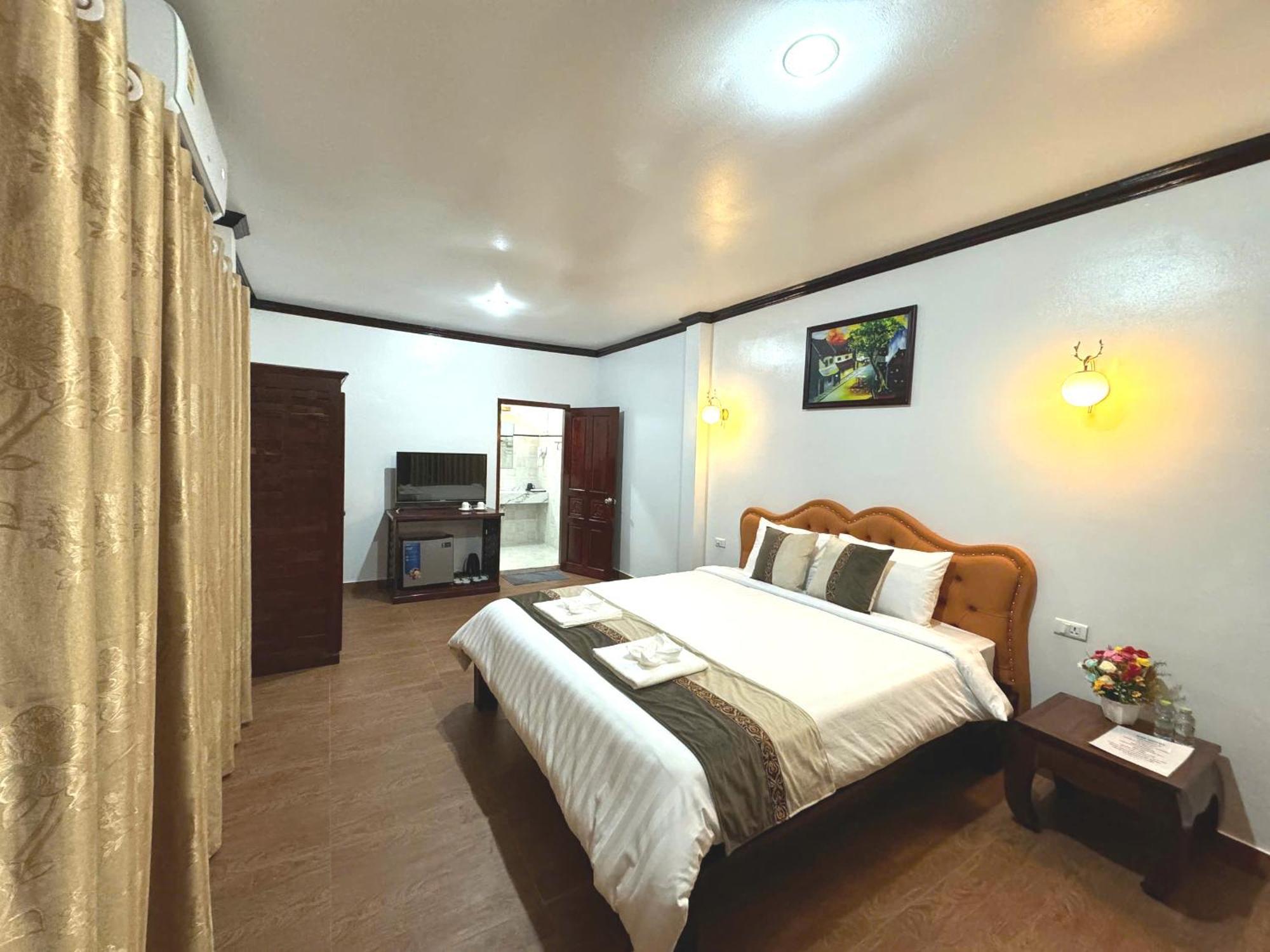 Win Hotel Vang Vieng Exterior photo